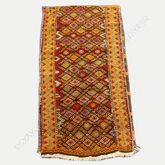 A large vintage kilim bedding bag