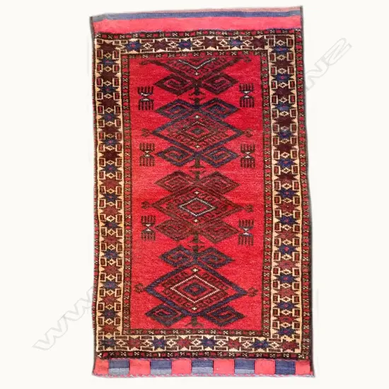 A large hand knotted bedding bag