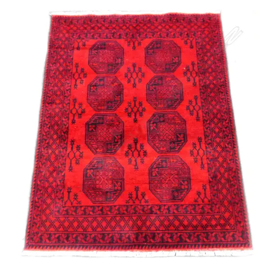 An Afghan hand knotted Turkman carpet