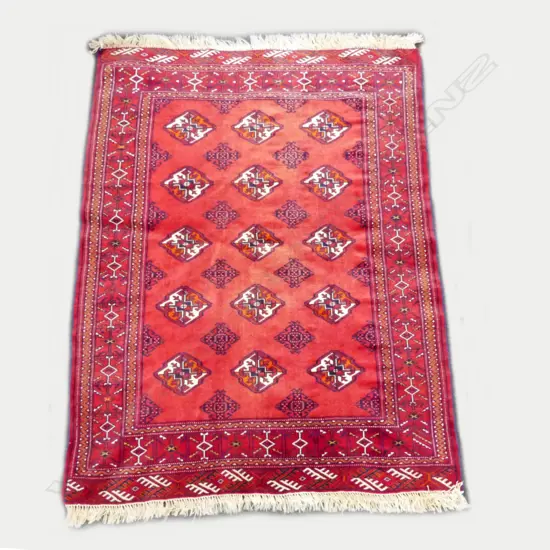 A hand knotted Iranian Turkman tribal rug