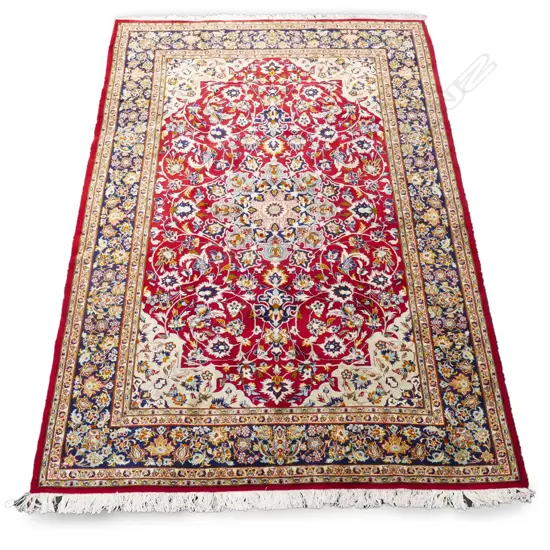 A large Iranian Isphahan hand knotted carpet