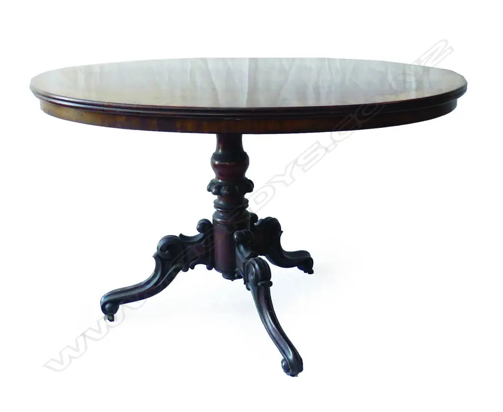A Victorian flame mahogany occasional table Image 1++