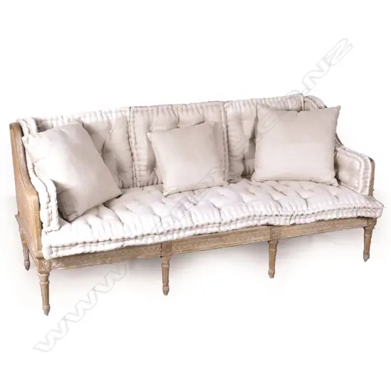 A lightly whitewashed oak framed canape