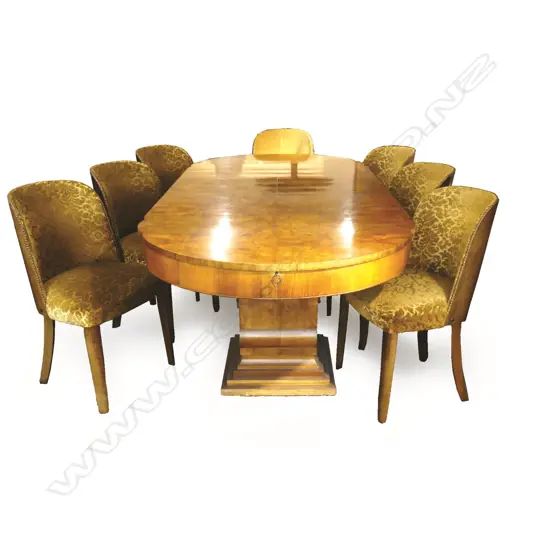 An impressive Art Deco walnut dining suite