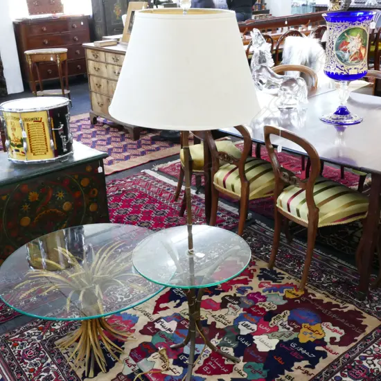 A mid-century Hollywood Regency gilt metal table based standard lamp