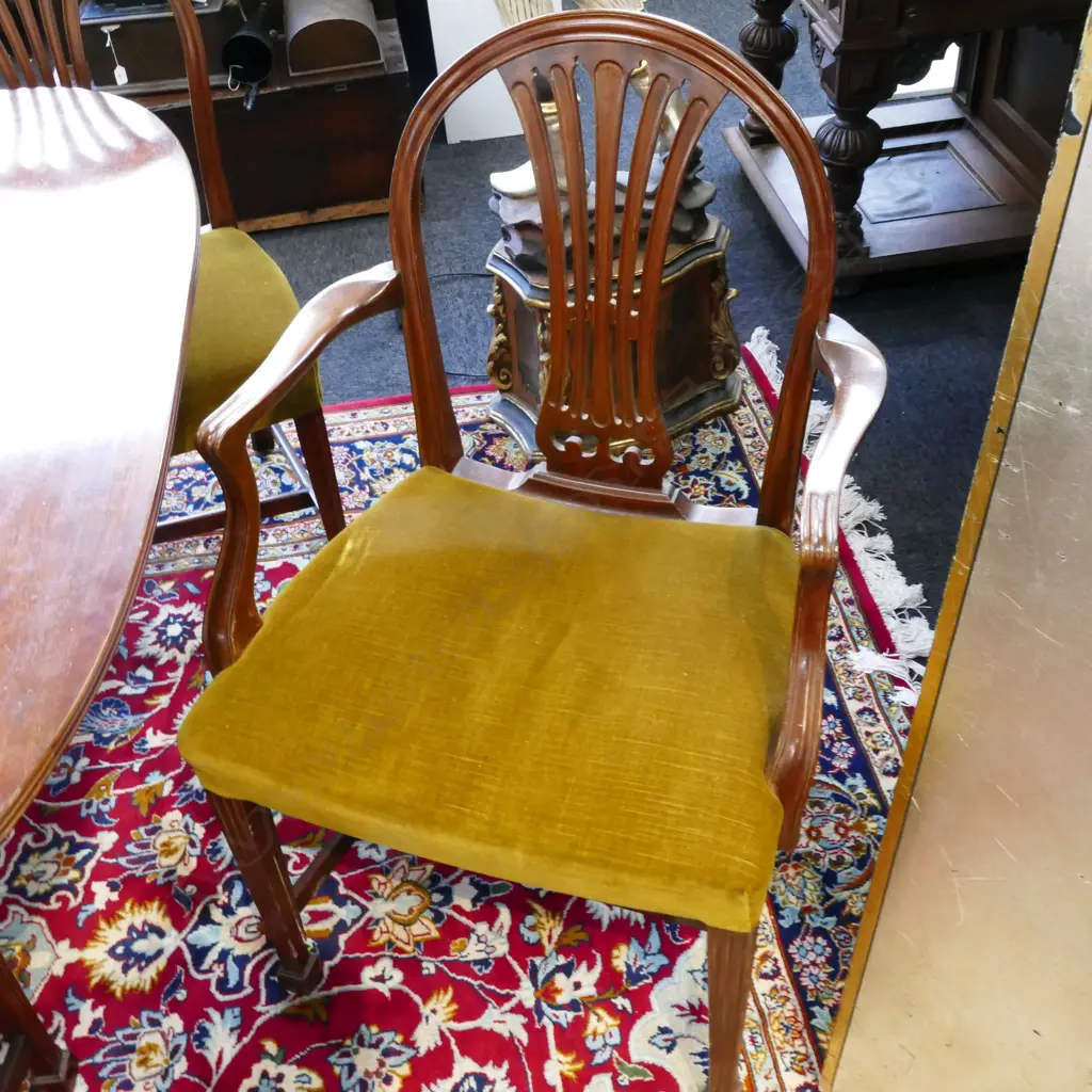 A mahogany banqueting extension Regency style dining table and sixteen Hepplewhite style chairs Image 1++
