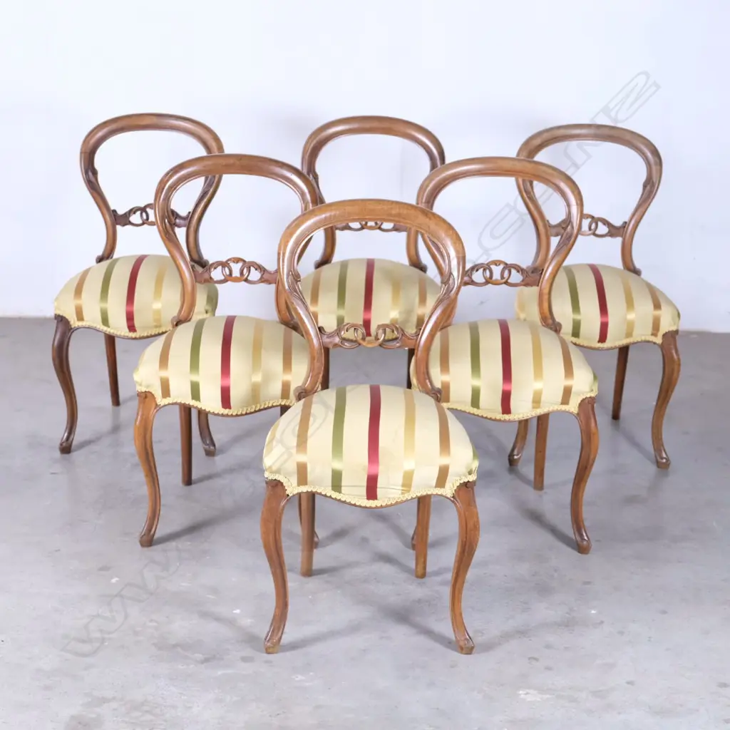 A set of six Victorian mahogany balloon back dining chairs Image 1++