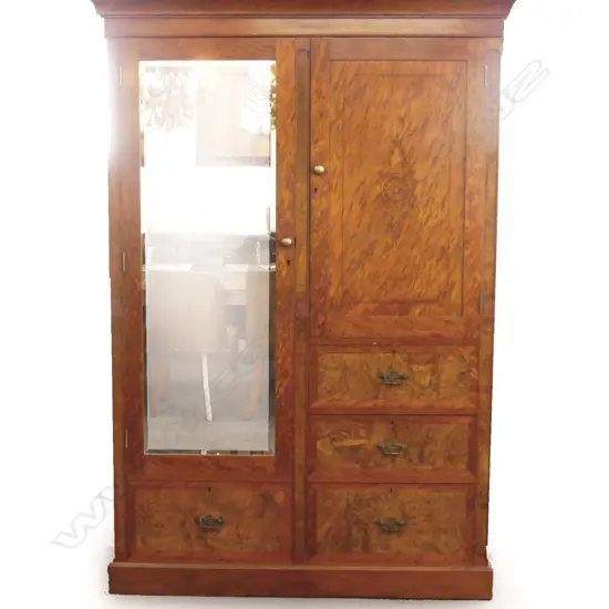 An impressive small proportion colonial mottled kauri wardrobe