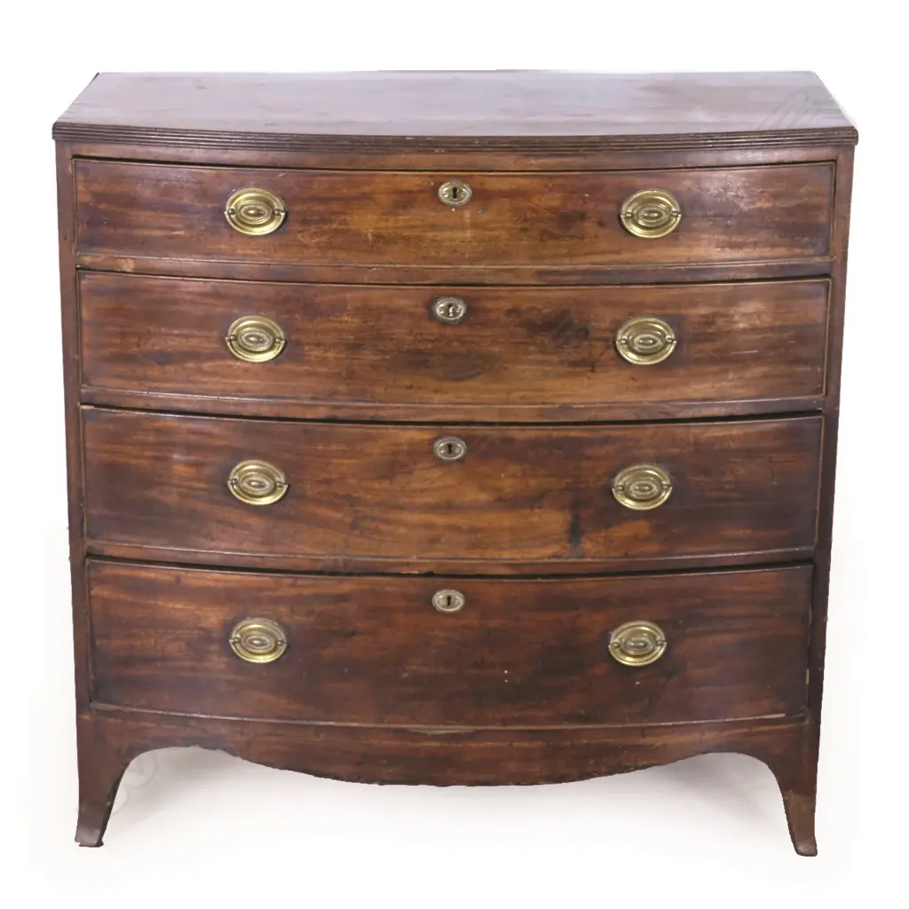 A Georgian mahogany bow front four drawer chest Image 1++