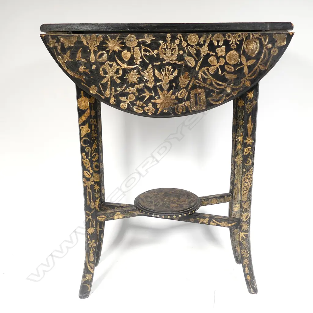 An Edwardian decoupaged small occasional table Image 1++