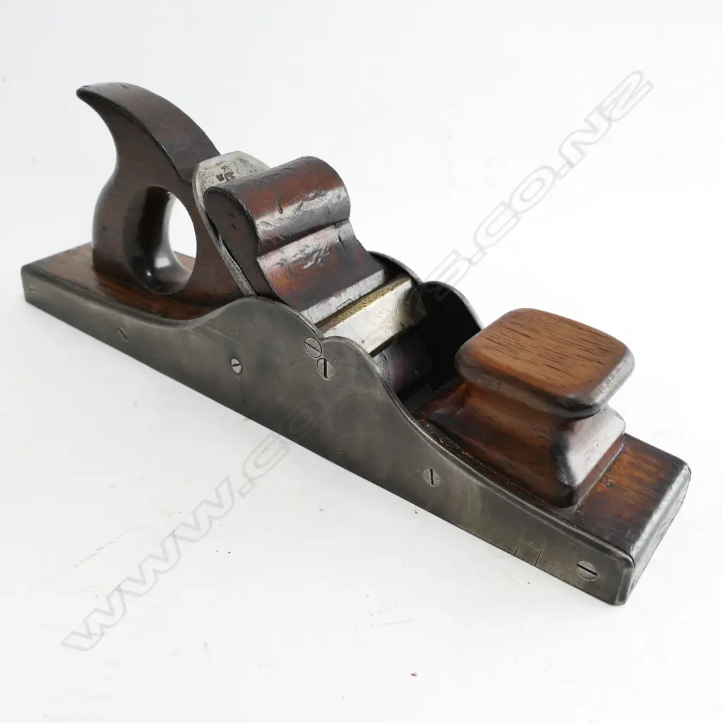 An early 19thC steel and rosewood panel plane Image 1++