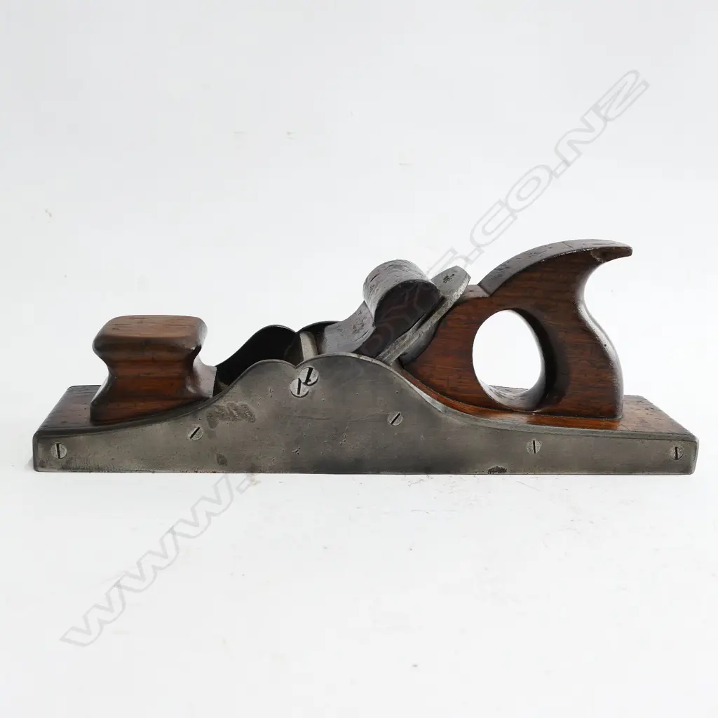 An early 19thC steel and rosewood panel plane Image 1++