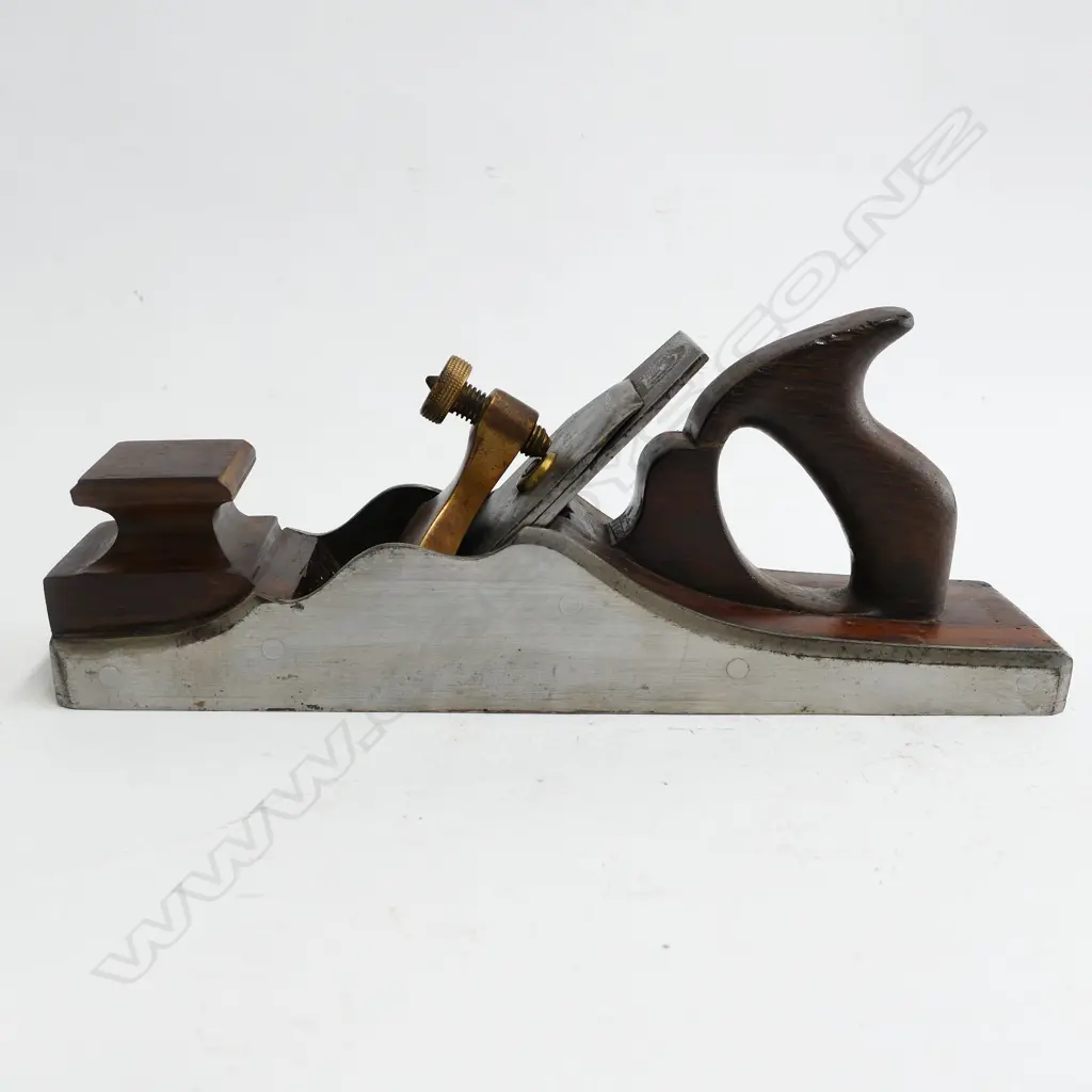 A 19thC 13½" steel and rosewood panel plane Image 1++