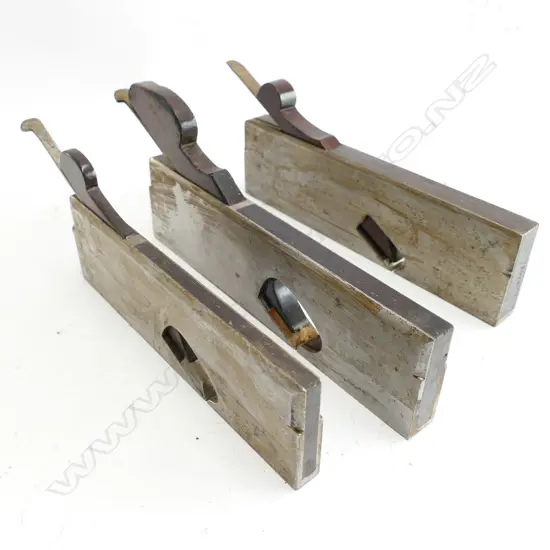 Three rosewood infill steel rebate planes