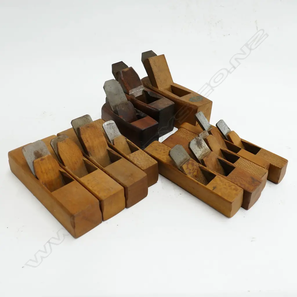 Three small block planes and nine craftsman made pattern-maker's planes Image 1++