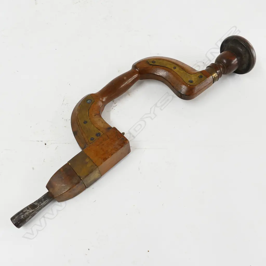 A brass plated brace Image 1++