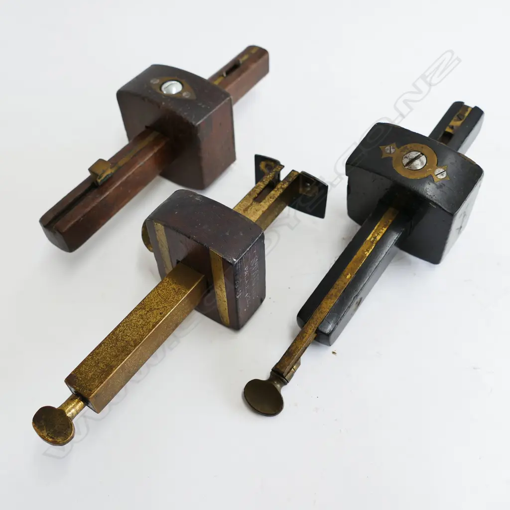 Two brass and rosewood gauges and a veneer cutting gauge Image 1++