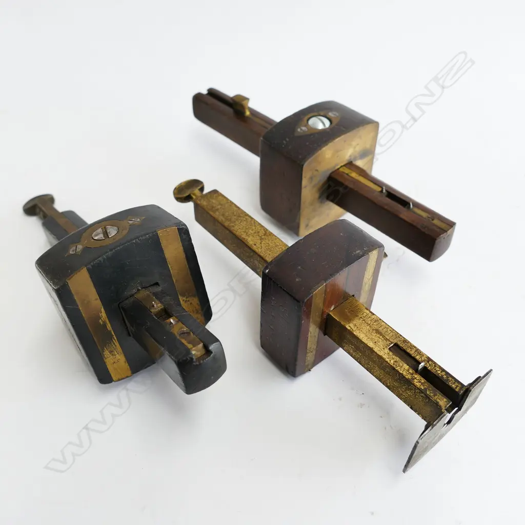 Two brass and rosewood gauges and a veneer cutting gauge Image 1++