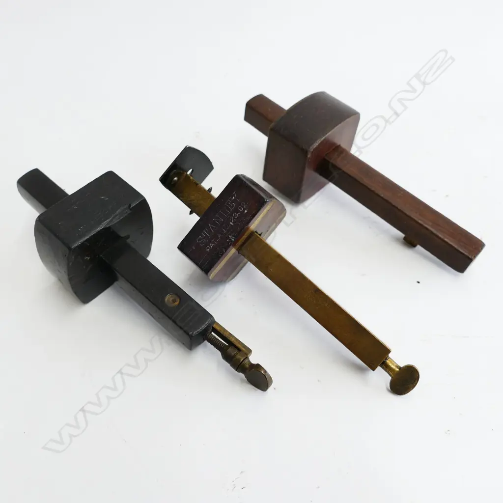 Two brass and rosewood gauges and a veneer cutting gauge Image 1++