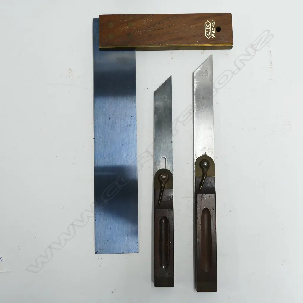A rosewood and steel set square Image 1++