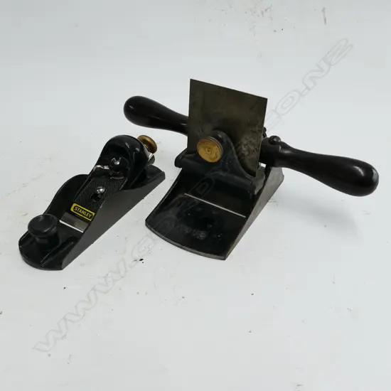 A Stanley No.12 two handled scraper and a small Stanley plane