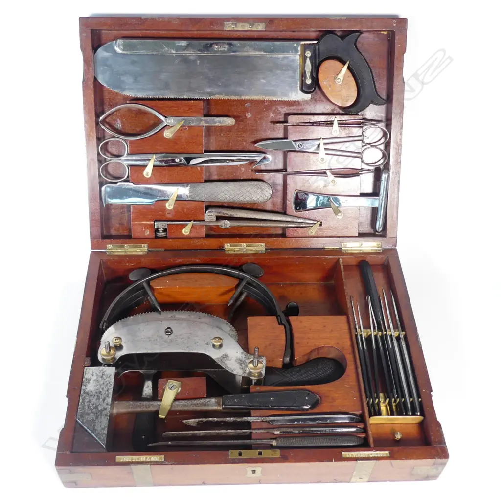 A rare cased coroner's instrument set manufactured by John Weiss & Son Image 1++