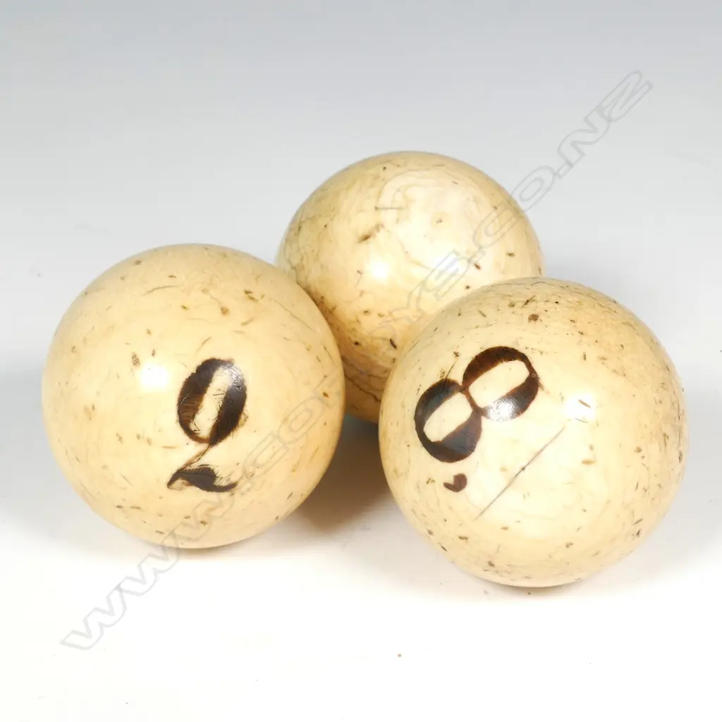 Three 19thC ivory billiard balls Image 1++