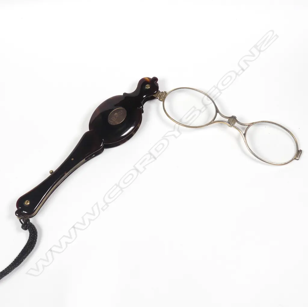 A c.1860s faux tortoiseshell and gold plated lady's lorgnette Image 1++