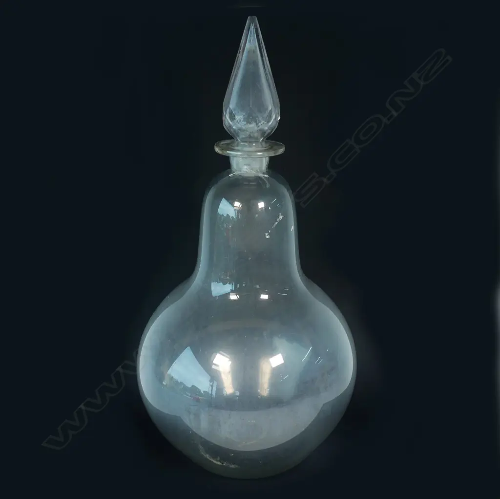 A tall late 19thC glass pharmaceutical display bottle Image 1++