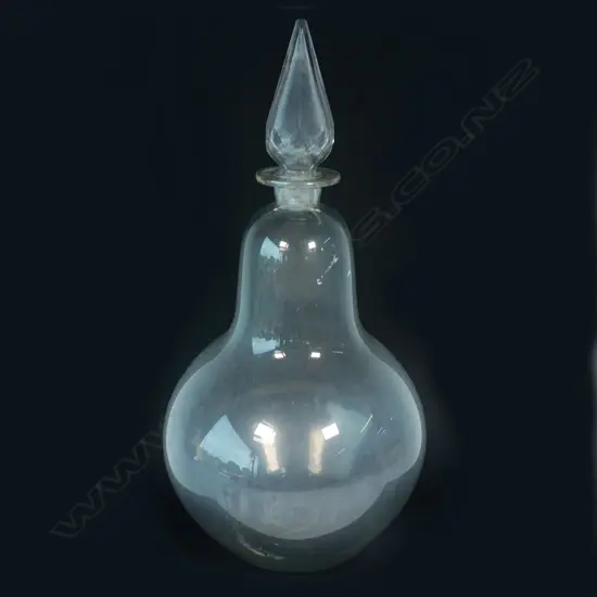 A tall late 19thC glass pharmaceutical display bottle