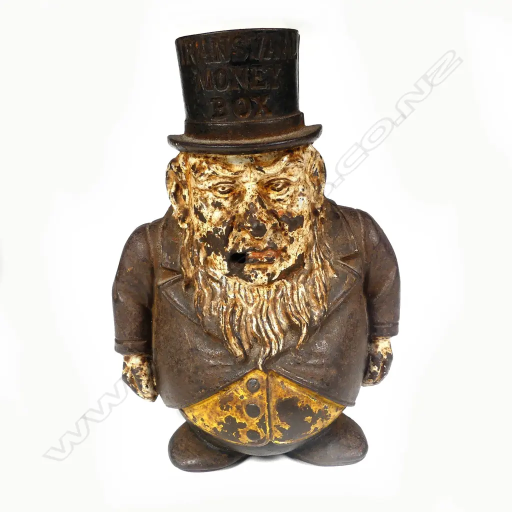 A cast iron 'Transvaal Money Box' figured as S.A. President Kruger Image 1++