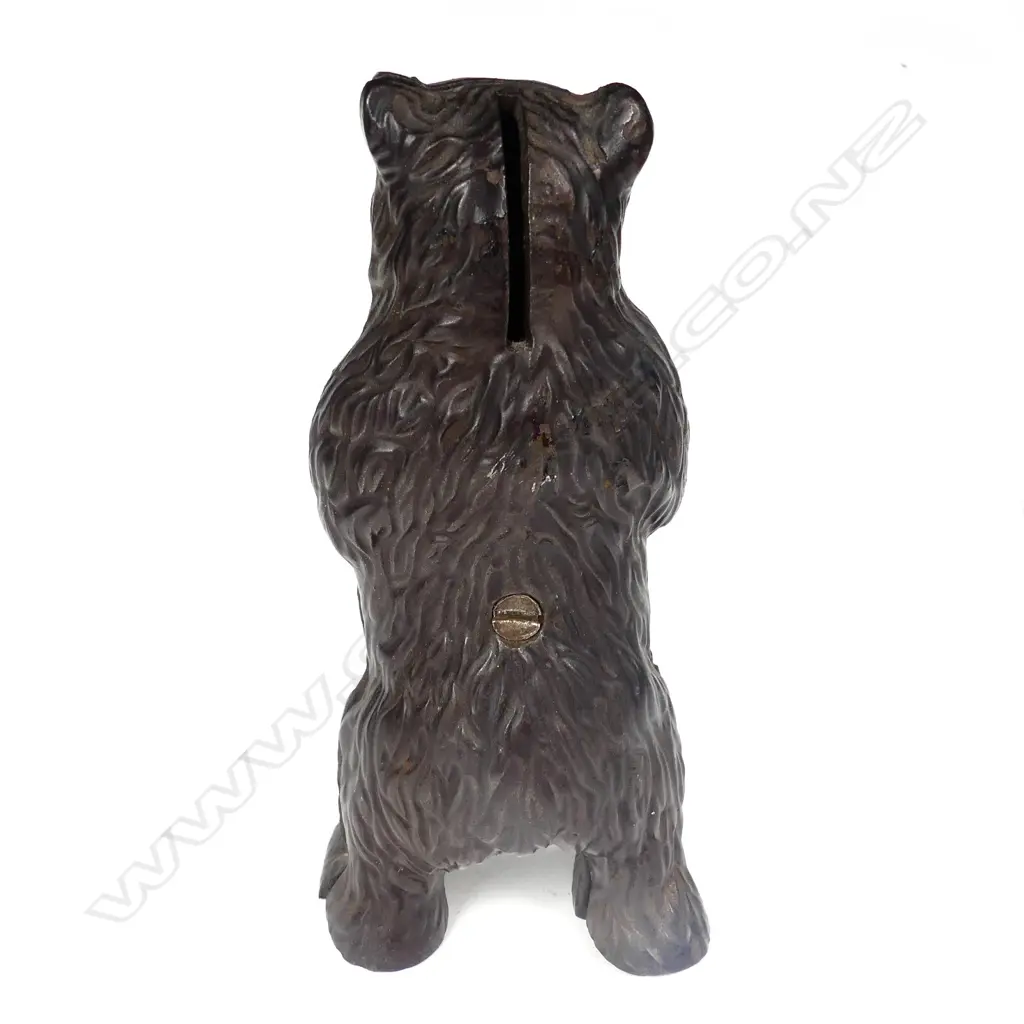 A cast iron standing bear money box Image 1++