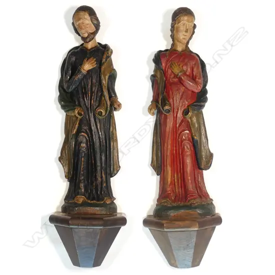 A pair of wooden antique Spanish religious figures