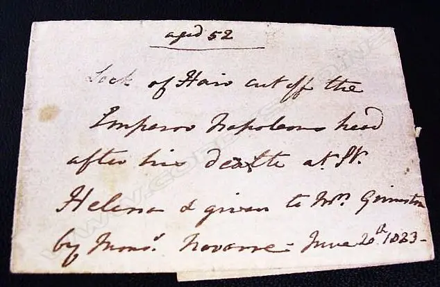 A lock of hair cut off the Emperor Napoleon's head after his death at St. Helena Image 1++
