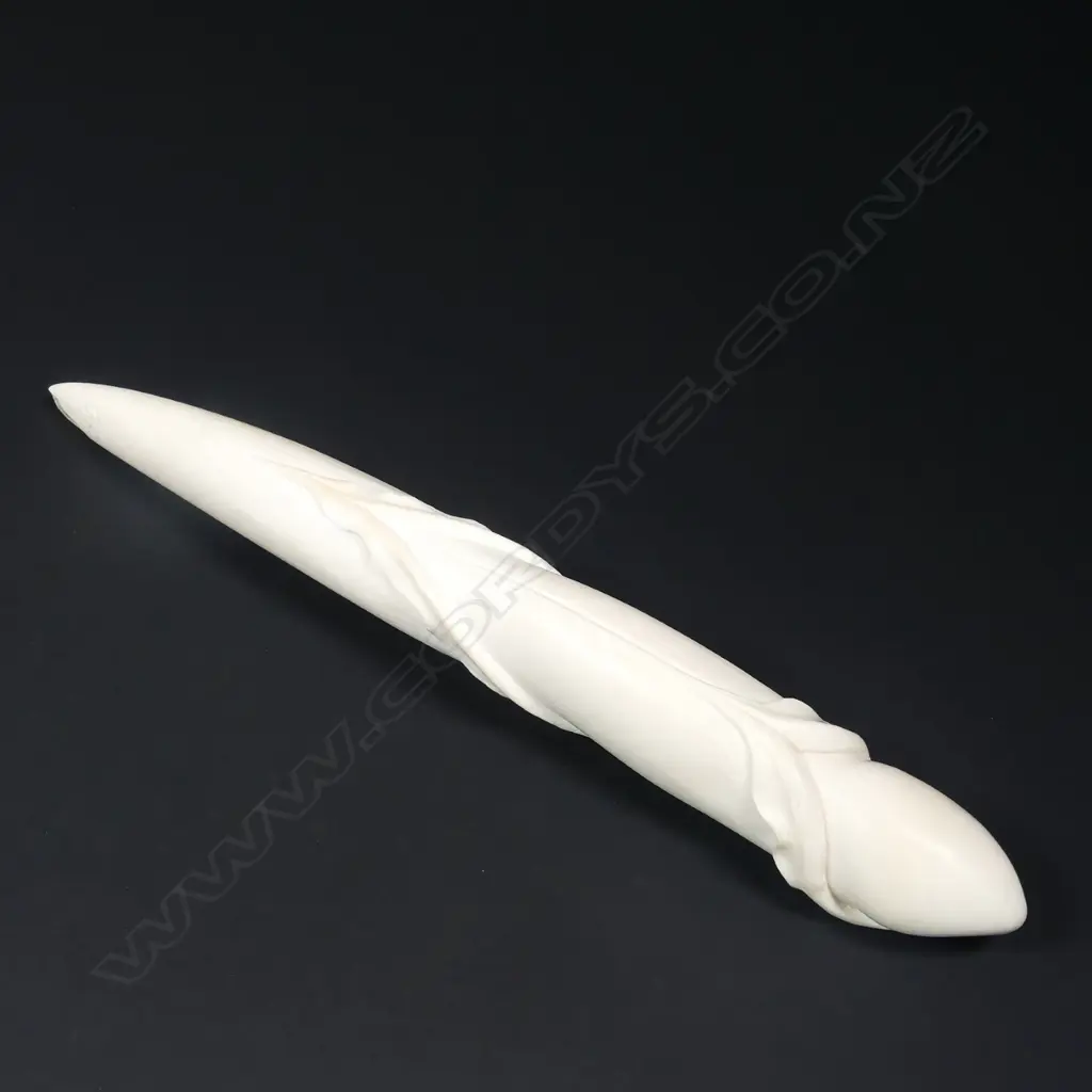 Des Baker carved ivory tusk as a revealing form Image 1++