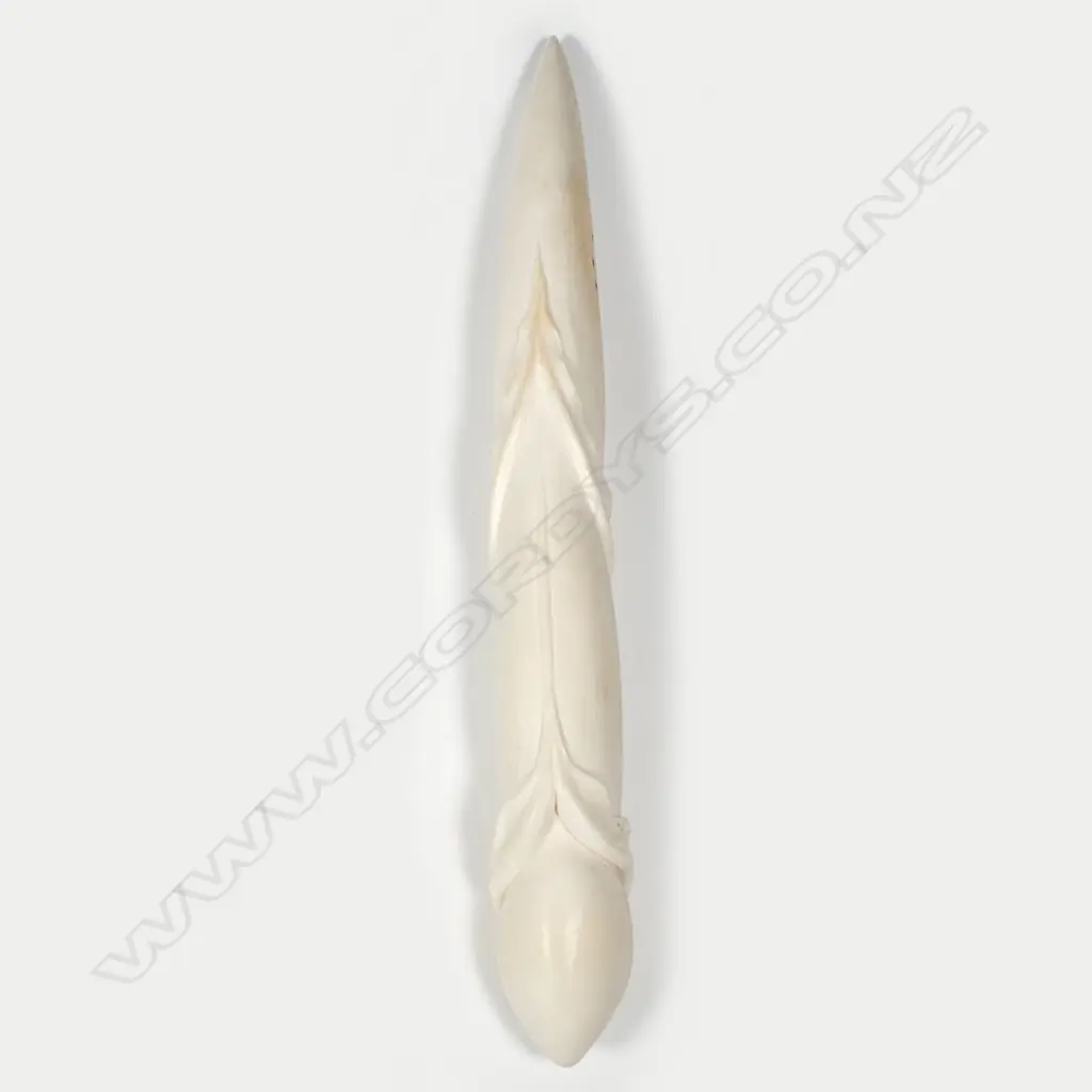 Des Baker carved ivory tusk as a revealing form Image 1++