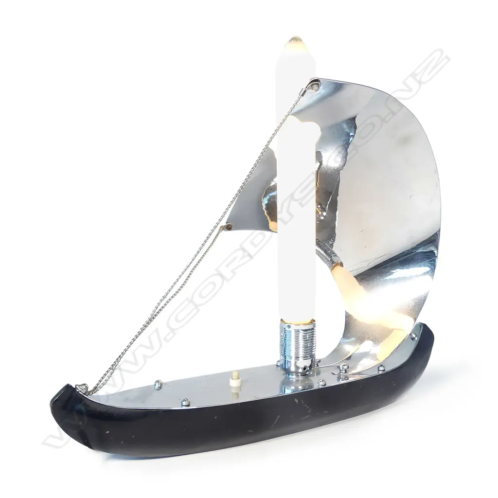 An Art Deco chrome and ebonised metal stylised Viking sailboat lamp Image 1++