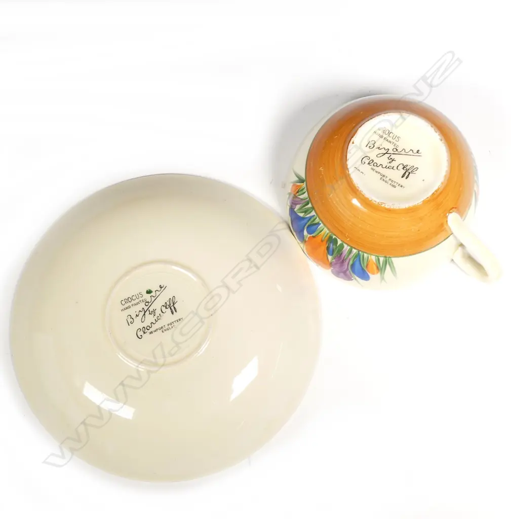 A Clarice Cliff Bizarre cup and saucer Image 1++