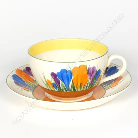 A Clarice Cliff Bizarre cup and saucer