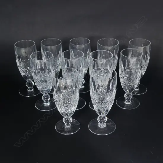 Eleven Waterford crystal champagne flutes