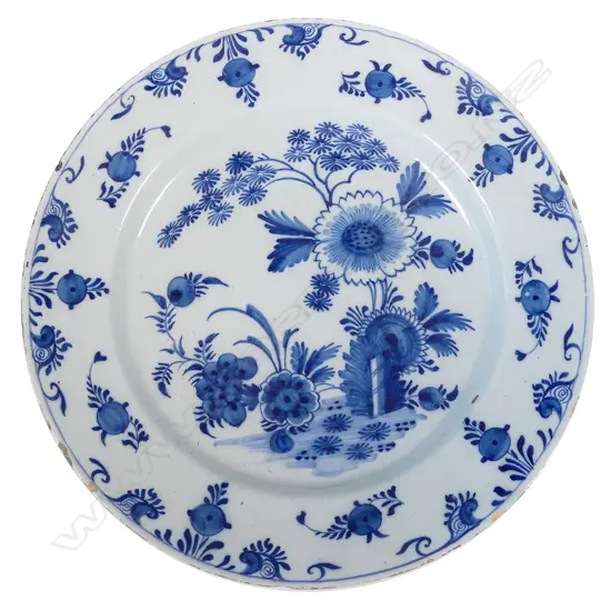 A large Delft blue and white tin glazed charger