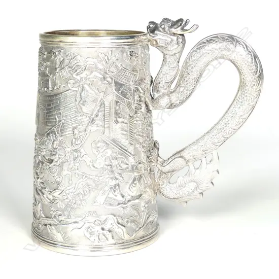 A 19thC Chinese decorative large silver mug