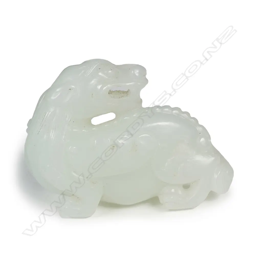 A Chinese white jade dragon handling piece/pendant Image 1++