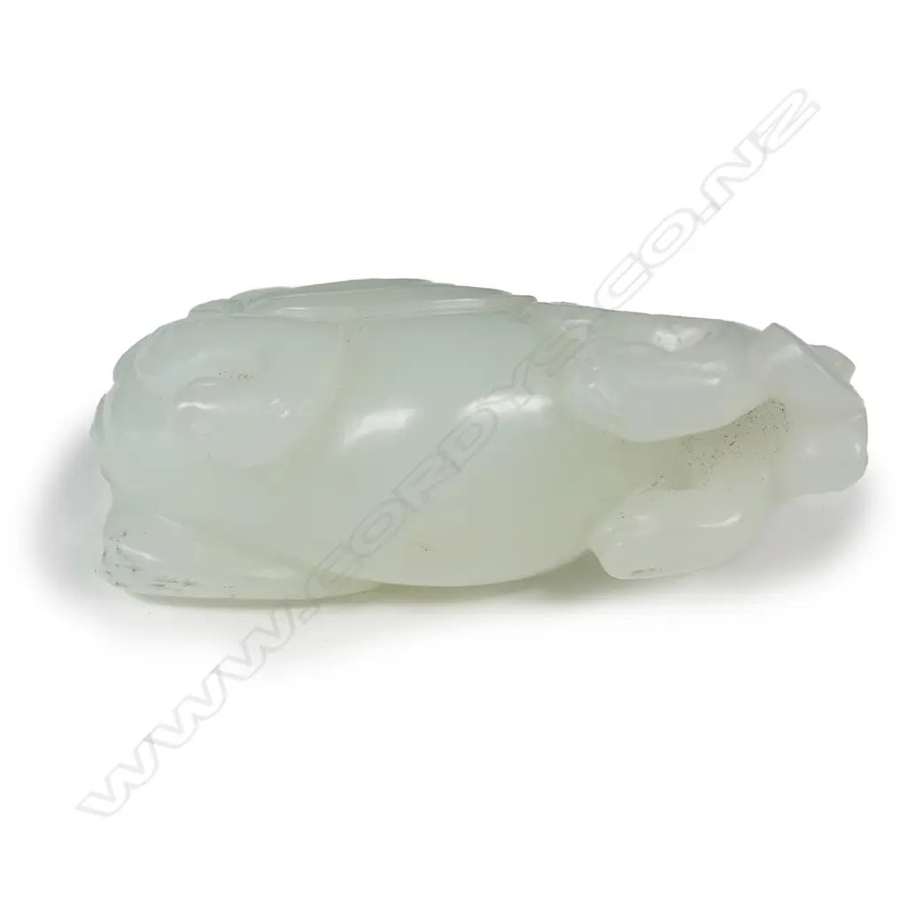 A Chinese white jade dragon handling piece/pendant Image 1++