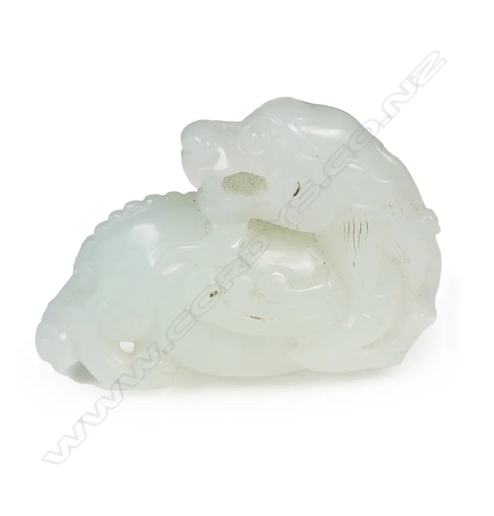 A Chinese white jade dragon handling piece/pendant Image 1++