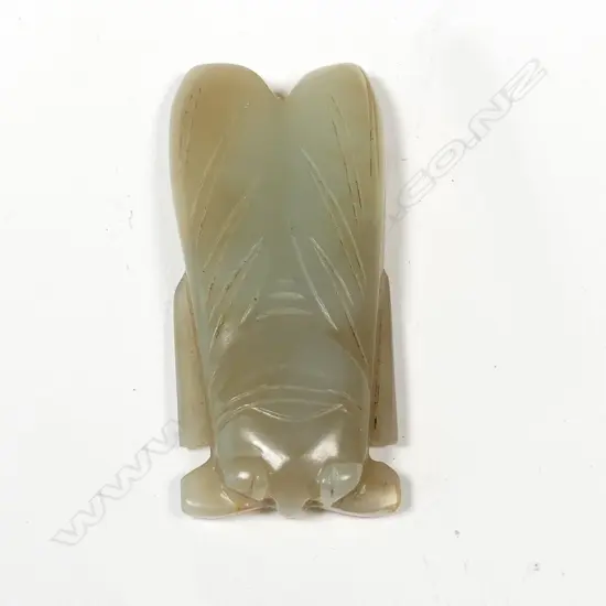 A Chinese carved jade cicada pendant