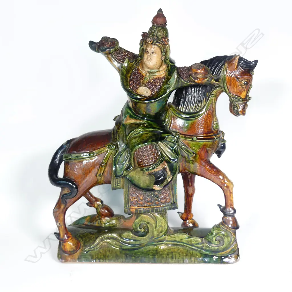An old Chinese Sancai-glazed ridge tile of a warrior on horseback Image 1++