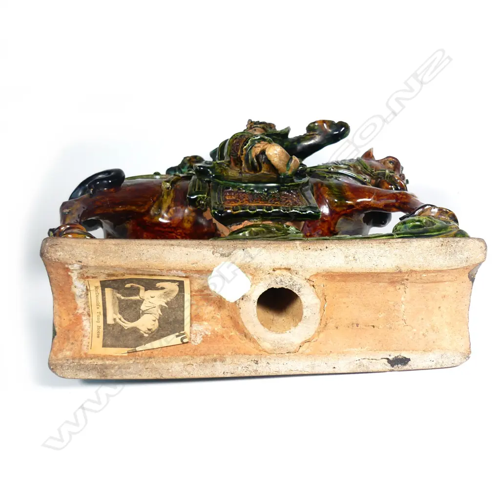 An old Chinese Sancai-glazed ridge tile of a warrior on horseback Image 1++