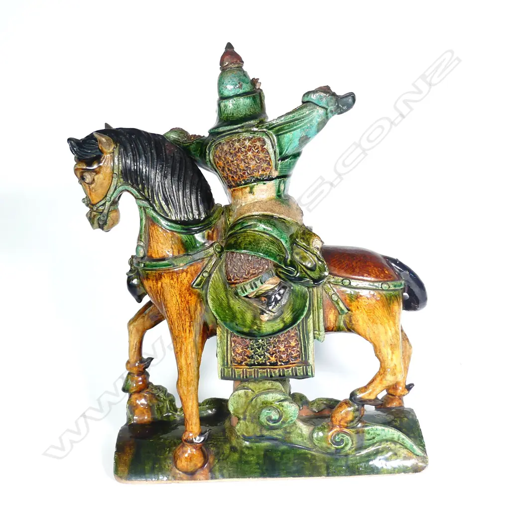 An old Chinese Sancai-glazed ridge tile of a warrior on horseback Image 1++