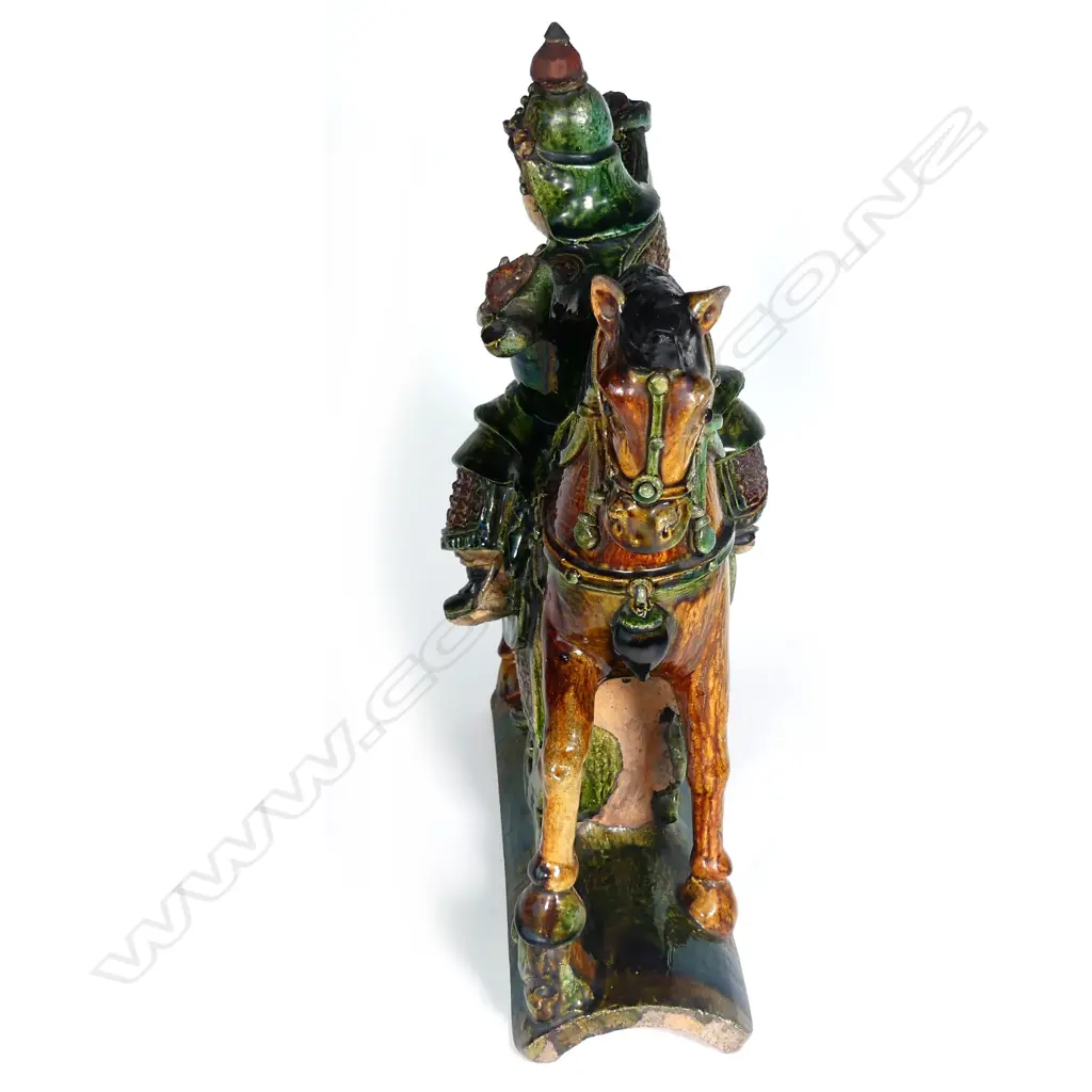 An old Chinese Sancai-glazed ridge tile of a warrior on horseback Image 1++